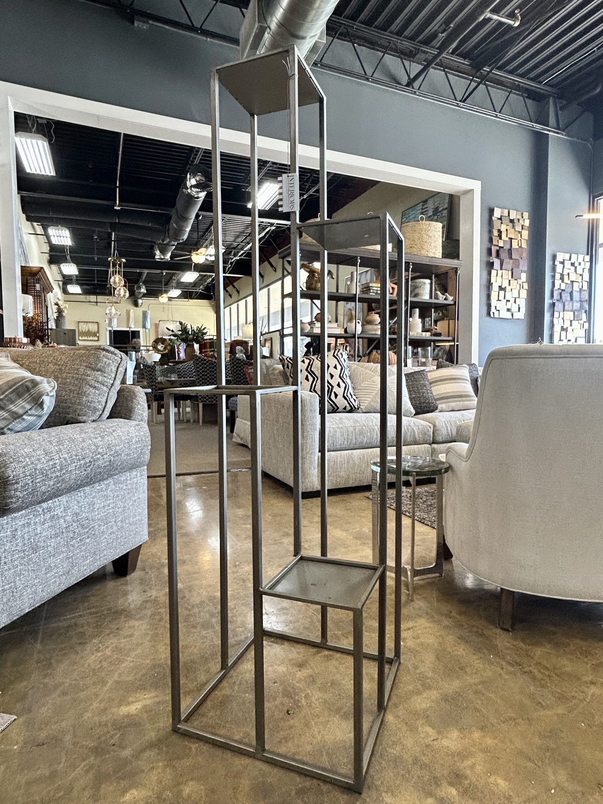 4 tiered iron pedestal available at Interiors Designer in Tulsa, Oklahoma